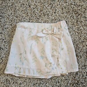 Light Pink Floral Mini Skirt with Bow Accent